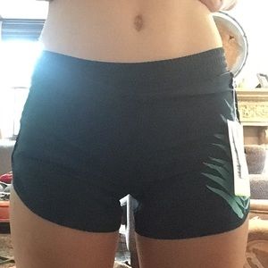 Old navy dark green fitness shorts with green leaf